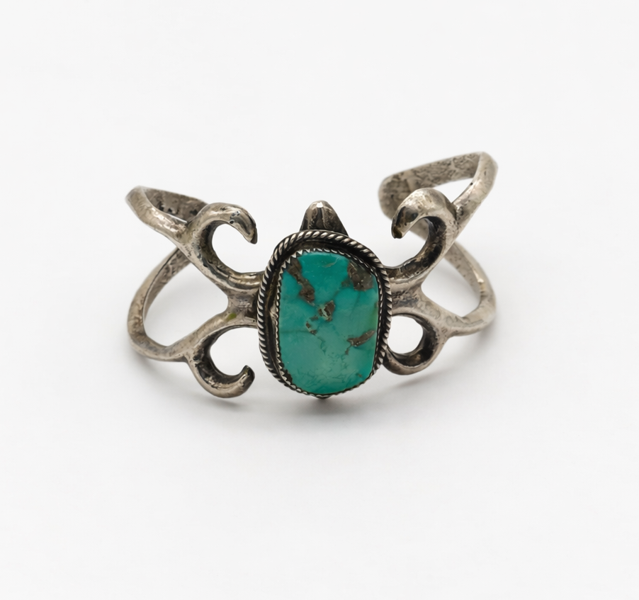 Navajo sand cast silver & turquoise cuff bracelet