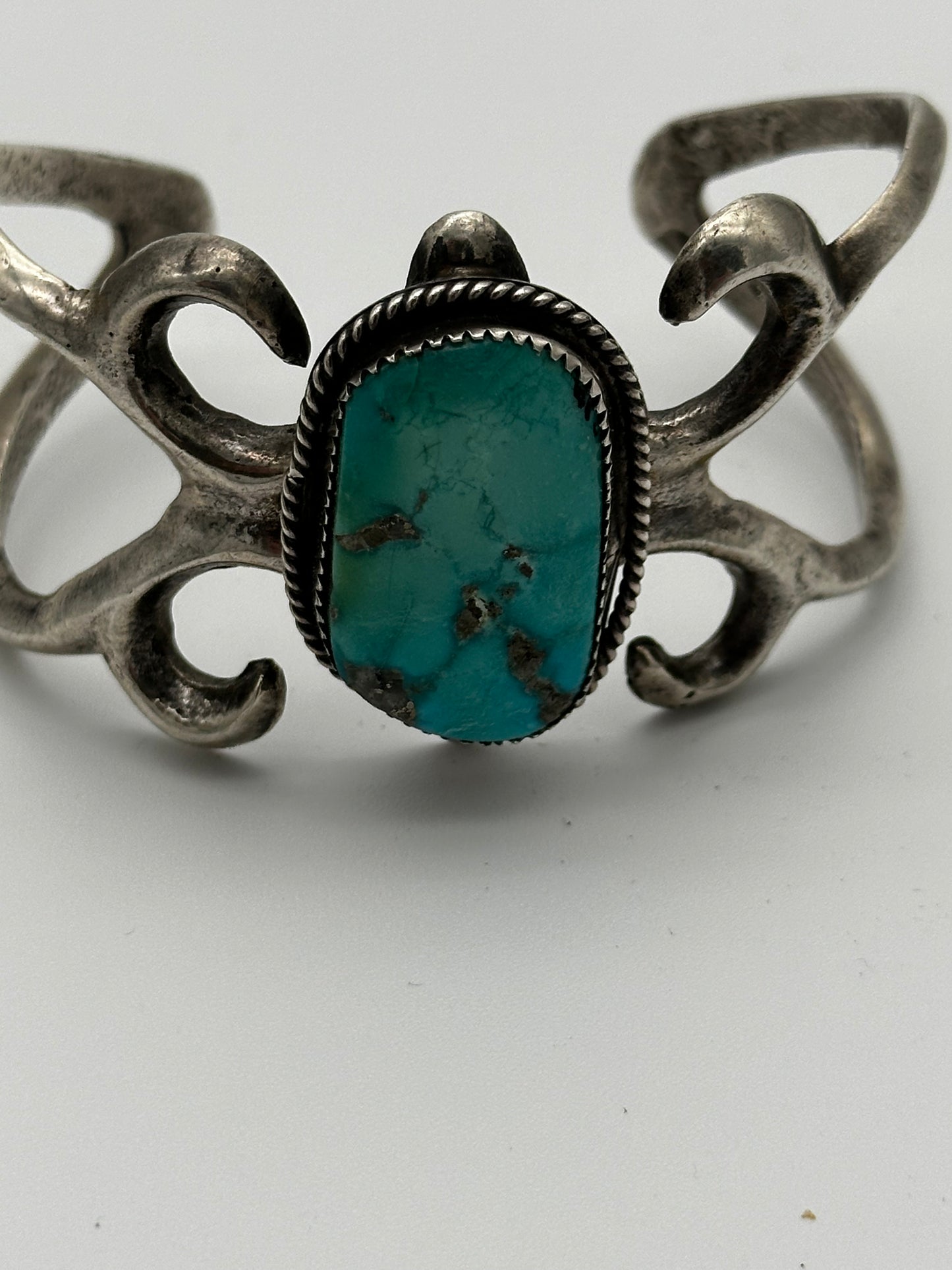 Navajo sand cast silver & turquoise cuff bracelet